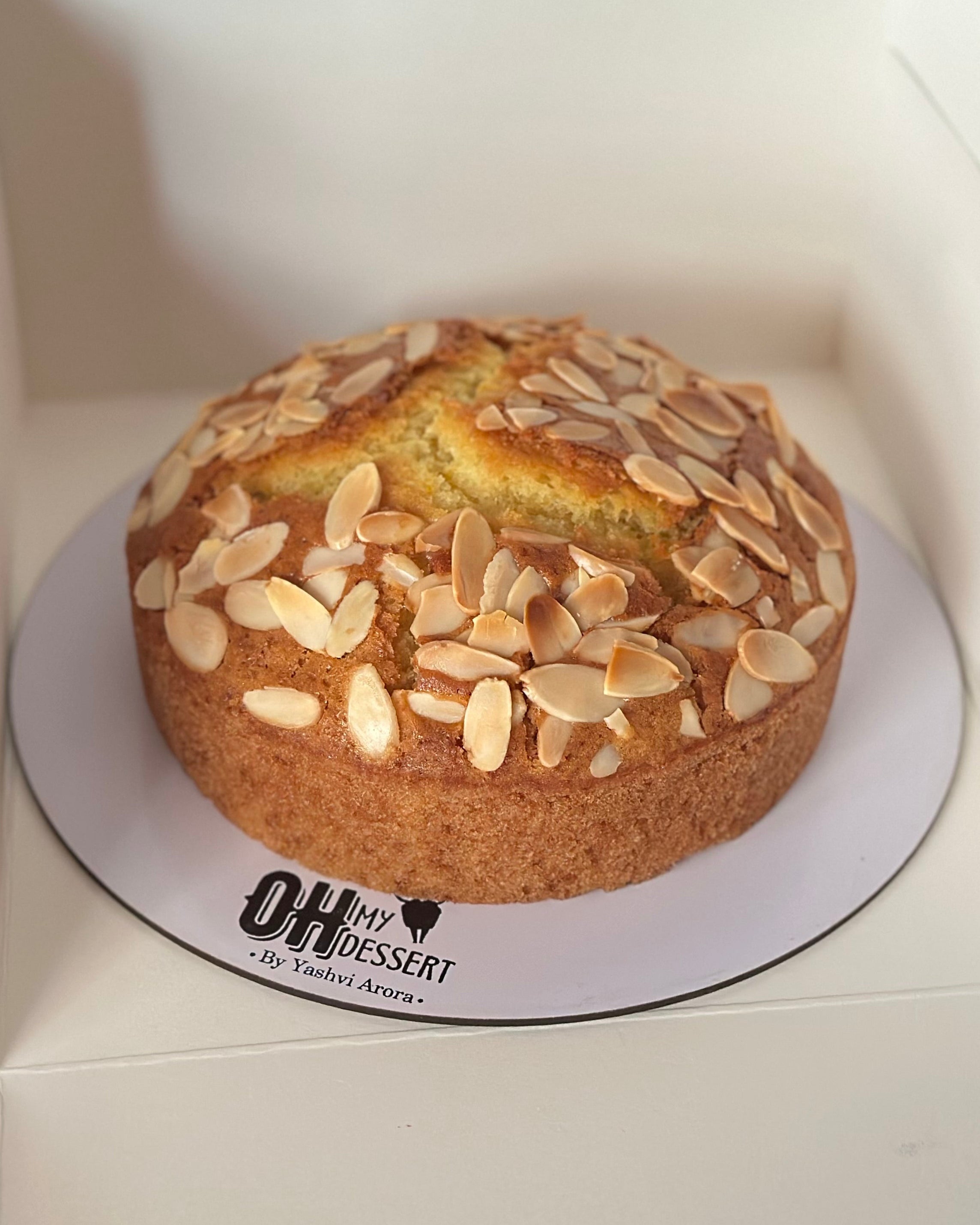Orange Almond Tea Cake, eggless, freshly baked by Oh! My Dessert in Vikaspuri, West Delhi